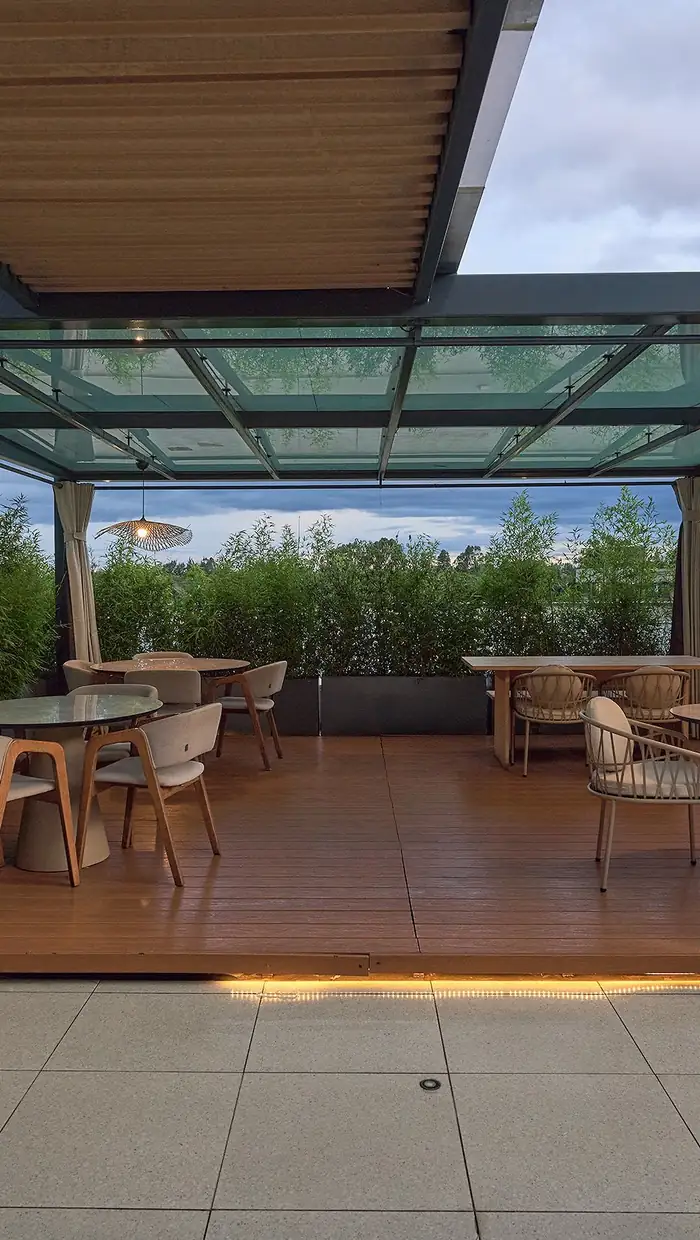 Rooftop tables under the pergola